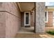 Front entryway of a home featuring a storm door, and neutral color palette at 15221 N Clubgate Dr # 1110, Scottsdale, AZ 85254