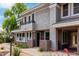 Inviting two-story condo featuring a stucco exterior, charming balcony, and well-maintained landscaping at 15221 N Clubgate Dr # 1110, Scottsdale, AZ 85254