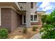 View of exterior showing covered entry and manicured landscaping at 15221 N Clubgate Dr # 1110, Scottsdale, AZ 85254