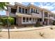 Townhome with manicured landscaping and shade trees at 15221 N Clubgate Dr # 1110, Scottsdale, AZ 85254