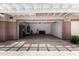 View into the garage of this home shows epoxy floors, new garage door hardware, and utility hookups at 15221 N Clubgate Dr # 1110, Scottsdale, AZ 85254