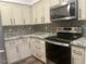 Modern kitchen with granite countertops and stainless steel appliances at 15221 N Clubgate Dr # 1110, Scottsdale, AZ 85254