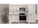 Kitchen with stainless steel appliances, granite countertops, and modern cabinetry at 15221 N Clubgate Dr # 1110, Scottsdale, AZ 85254