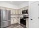 Well-equipped kitchen with stainless steel appliances and plenty of cabinet space for storage at 15221 N Clubgate Dr # 1110, Scottsdale, AZ 85254