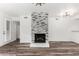 Inviting living room with modern fireplace, sleek flooring, and recessed lighting for a cozy ambiance at 15221 N Clubgate Dr # 1110, Scottsdale, AZ 85254