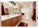 Bathroom with double vanity and large shower at 19425 N Guardian Ln, Surprise, AZ 85387