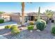 Single-story home with desert landscaping and a two-car garage at 19425 N Guardian Ln, Surprise, AZ 85387