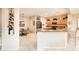 Kitchen boasts granite countertops and ample cabinetry at 19425 N Guardian Ln, Surprise, AZ 85387