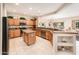 Modern kitchen with large island and breakfast bar at 19425 N Guardian Ln, Surprise, AZ 85387