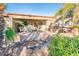 Outdoor patio with seating, grill, and water feature at 19425 N Guardian Ln, Surprise, AZ 85387