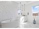 Beautiful bathroom with a freestanding tub, elegant finishes, and modern lighting, designed for relaxation and comfort at 19702 E Melissa Pl, Queen Creek, AZ 85142