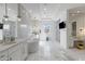 Luxurious bathroom with dual vanities, a soaking tub, and a glass-enclosed shower, providing a spa-like experience at 19702 E Melissa Pl, Queen Creek, AZ 85142