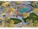 Aerial view showing tennis courts and playground at 27432 N 66Th Way, Scottsdale, AZ 85266