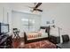Charming bedroom with a full-size bed and a view of the backyard at 27432 N 66Th Way, Scottsdale, AZ 85266