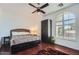 Comfortable bedroom with a queen-size bed and plenty of natural light at 27432 N 66Th Way, Scottsdale, AZ 85266