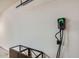 Garage with electric vehicle charger at 27432 N 66Th Way, Scottsdale, AZ 85266