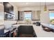 Modern kitchen with stainless steel appliances at 27432 N 66Th Way, Scottsdale, AZ 85266