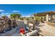 Relaxing patio area with fireplace and seating at 27432 N 66Th Way, Scottsdale, AZ 85266