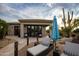 Relaxing patio with seating and desert landscaping at 27432 N 66Th Way, Scottsdale, AZ 85266