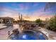 Relax in this luxurious pool and spa area at 27432 N 66Th Way, Scottsdale, AZ 85266