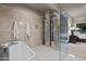 Spa-like bathroom with soaking tub, large shower, and glass enclosure at 5800 E Glen Dr, Paradise Valley, AZ 85253
