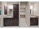 Double vanity bathroom with granite counters and ample storage at 5800 E Glen Dr, Paradise Valley, AZ 85253