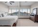 Primary bedroom with mountain views and dresser at 5800 E Glen Dr, Paradise Valley, AZ 85253