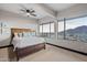 Bedroom with mountain views and ceiling fan at 5800 E Glen Dr, Paradise Valley, AZ 85253