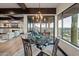 Charming dining area with a glass-top table and scenic views at 5800 E Glen Dr, Paradise Valley, AZ 85253