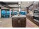 Spacious kitchen with island, hardwood floors, and a stunning mountain view at 5800 E Glen Dr, Paradise Valley, AZ 85253