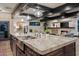 Eat-in kitchen with island, stainless steel appliances, and open concept at 5800 E Glen Dr, Paradise Valley, AZ 85253