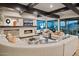 Open living area with curved sectional sofa and expansive mountain views at 5800 E Glen Dr, Paradise Valley, AZ 85253