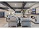 Open living space with hardwood floors and a stone fireplace at 5800 E Glen Dr, Paradise Valley, AZ 85253
