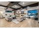 Modern living room with a cozy fireplace and hardwood floors at 5800 E Glen Dr, Paradise Valley, AZ 85253