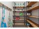 Well-organized pantry with ample shelving and storage at 5800 E Glen Dr, Paradise Valley, AZ 85253