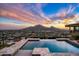 Infinity pool at sunset, offering panoramic views at 5800 E Glen Dr, Paradise Valley, AZ 85253