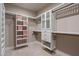 Bright walk-in closet with ample shelving and hanging space at 5800 E Glen Dr, Paradise Valley, AZ 85253