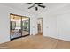 Bright bedroom with sliding doors to patio and hardwood floors at 6733 N 14Th St, Phoenix, AZ 85014