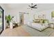 Main bedroom with sliding barn door and access to en-suite bathroom at 6733 N 14Th St, Phoenix, AZ 85014