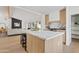 Open concept kitchen with large island and marble countertops at 6733 N 14Th St, Phoenix, AZ 85014
