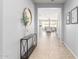 View through entryway to living room with neutral decor at 7109 E Plata Ave, Mesa, AZ 85212