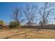 Large backyard with mature trees and plenty of open space at 10407 W Catalina Dr, Avondale, AZ 85392