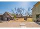Large backyard with mature trees, a shed, and plenty of space at 10407 W Catalina Dr, Avondale, AZ 85392