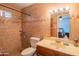 Bathroom with shower, toilet and vanity at 10407 W Catalina Dr, Avondale, AZ 85392