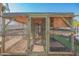 Large outdoor chicken coop with wood and wire fencing, providing a secure space at 10407 W Catalina Dr, Avondale, AZ 85392