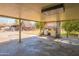 Covered patio with washer and dryer hookups, plus a view of the backyard at 10407 W Catalina Dr, Avondale, AZ 85392