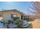 House with a walkway and blooming flowers at 10407 W Catalina Dr, Avondale, AZ 85392