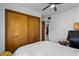 Bedroom with double door closet and view of hallway at 1238 E Yucca St, Phoenix, AZ 85020