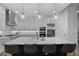 Spacious kitchen with a large island, stainless steel appliances, and an open layout to dining area at 14828 E Valley Vista Dr, Fountain Hills, AZ 85268