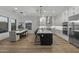 Bright, open kitchen with a large island, modern appliances, and hardwood floors at 14828 E Valley Vista Dr, Fountain Hills, AZ 85268